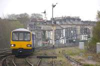 Pacer 144009 enters Harrogate from the north with a Knaresborough - Leeds service on 17 April 2009. The signal gantry in the background formerly spanned the goods yard throat.<br>
<br><br>[Bill Roberton 17/04/2009]