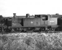 McIntosh 2P 0-4-4T no 55266 awaiting disposal in the sidings at Lugton on 13 April 1963, some 18 months after official withdrawal from Corkerhill shed. The locomotive was eventually cut up at Connels of Coatbridge the following September. <br><br>[David Pesterfield 13/04/1963]