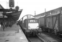 Train 1S58, the 11.10am summer Saturday Blackpool North - Kirkcaldy prepares to leave Carlisle platform 1 on 31 July 1965 behind Claytons D8581+D8582.<br><br>[K A Gray 31/07/1965]
