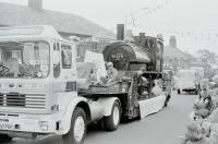 A special visitor to Leyland Festival in 1976 was L&YR <I>Pug</I> 51218, from the Worth Valley, in light steam on this lowloader. The Leyland tractor unit looks like a preserved lorry but was of course a brand new demonstrator vehicle from the nearby Leyland Trucks plant. Sister loco 11243 is presently (2009) a static exhibit at the nearby Ribble Steam Railway museum in Preston, [See image 23456] and 51218 is based at the Keighley and Worth Valley Railway. <br><br>[Mark Bartlett 05/06/1976]