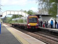 170 476 about to pick up post-lunch trippers to Glasgow from Bishopbriggs on 2 May 2009.<br><br>[David Panton 02/05/2009]