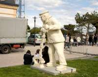 <I>Sacrebleu... </I> the French seem to be fond of action statues, such as this one, seen at Cayuex-sur-Mer in April 2009, depicting a railwayman changing points.<br><br>[Peter Todd 25/04/2009]