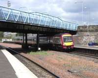 170 476 emerges from the triple bridge at Larbert on 7 May with an Alloa - Glasgow Queen Street service.<br><br>[David Panton 07/05/2009]