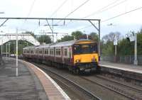 318 259 with an eastbound service at Jordanhill on 02 May 2009<br><br>[David Panton 02/05/2009]
