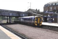 158 709 calls at Larbert with a Glasgow to Dunblane service on 7 May. In the other direction the Larbert Junction signal is set for the Edinburgh line.<br><br>[David Panton 07/05/2009]
