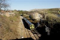 Looking east as Northern Rail 158756 approaches Hall Royd Junction near Todmorden on a York to Blackpool North service on 29 March 2009. The 194 yard Castle Hill Tunnel can be seen in the background.<br><br>[John McIntyre 29/03/2009]