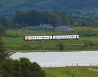 An Alphaline liveried 158 approaches Hilton Junction on the Edinburgh line on 5 June.<br><br>[Brian Forbes 05/06/2009]