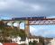 The new Edinburgh - Perth shuttle service, comprising a partially re-liveried First Scotrail 158, reaches the north shore of the Forth on 28 March.<br><br>[Brian Forbes 28/03/2009]