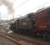 Having restarted from a stop in the Down loop 46115 gets the <I>Great Britain II</I> railtour underway again and pounds up the bank through Oxenholme station. <br><br>[Mark Bartlett 09/04/2009]