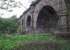 Viewed from the Lancaster to Wennington trackbed, John Rennie's Lune Aqueduct carries the Lancaster Canal across the River Lune on five arches, each spanning 70' and at least 50' above the river. This significant engineering achievement cost 48,000 in 1797, almost three times its original estimate, and is still open for canal traffic having outlived the railway by over 40 years already. Map Ref SD 485639. <br><br>[Mark Bartlett 24/04/2009]