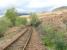 NBR West Highland Line across the A82 from The Falls of Falloch looking south.<br><br>[Alistair MacKenzie 28/04/2009]