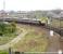 The Sunday morning 0908 Leeds - Glasgow Central CrossCountry service accelerates away from the stop at York on 19 April 2009. Most of the railway land in the background is earmarked for the massive York Central <I>'Teardrop'</I> development (so called because of the shape of the site) which will comprise over 86 acres of housing, offices and retail units and on which work is scheduled to start in the near future. <br>
<br><br>[John Furnevel 19/04/2009]