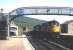 A train from Inverness to Kyle of Lochalsh arrives at Achnasheen in 1972. The connecting bus service to Gairlochwaits alongside the  platformto the left.<br>
<br><br>[Colin Miller //1972]