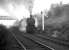 A hard working Q6 no 63379 climbs through Beamish past a notable North Eastern signal post hauling empty steel flats destined for Consett on 15 February 1964.<br><br>[K A Gray 15/02/1964]