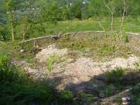 Old turntable pit alongside Garelochhead station in June 2009.<br><br>[Brian Smith 01/06/2009]