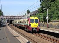 A 6-car 334 combination on a service to Motherwell via Blantyre seen at Cambuslang on 1 June 2009<br><br>[David Panton 01/06/2009]