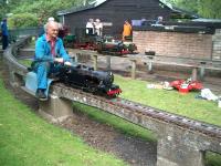 A group of railway modelling enthusiasts at Hammonds Pond, Carlisle, in June 2007.<br><br>[Brian Smith 10/06/2007]