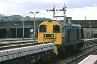 A permanent way train headed by 20 213 waits for a path north at Stirling in March 1986. A Class 27 loco was attached at the other end. The signal gantry survived until April 2008 when it was replaced in connection with the reopening of the line to Alloa.<br><br>[Mark Dufton /03/1986]