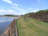 The kickback on the former Pier sidings at Wemyss Bay on 1 June,  with the chimney of the disused Inverkip power station in the distance.<br><br>[David Panton 01/06/2009]