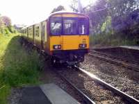 318 266 departs west from Hamilton Central on 16 June into the setting sun<br><br>[John Steven 16/06/2009]