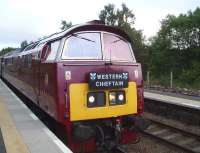 D1018 diesel hydraulic <i>Western Champion</i>, held at Carrbridge on the evening of 19 June with the <i>Western Chieftain</i> Bristol to Kyle railtour, waiting to cross the Inverness portion of the Caledonian Sleeper.<br><br>[Gus Carnegie 19/06/2009]