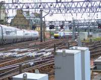 A Euston bound Virgin Pendolino exits Glasgow Central on 16 June 2009 as a National Express East Coast service from Kings Cross via Edinburgh runs into the station.<br><br>[Brian Smith 16/06/2009]