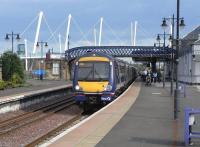 A 170 and a 158 form a Glasgow to Alloa commuter service at Stirling platform 6 on 16 June. Still busy leaving Stirling, I wonder what it was like leaving Glasgow...<br><br>[David Panton 16/06/2009]