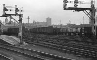 View from the end of Platforms 3 & 4 at Aberdeen into Guild Street Yard at a time when the yard was open and railfreight was plentiful, 20 February 1977. The container yard can be seen below the signal on the right.<br><br>[John McIntyre 20/02/1977]