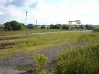 View over the goods yard at Elgin East on 26 June 2009.<br><br>[David Pesterfield 26/06/2009]