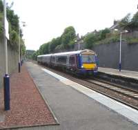 In the day's only brief spell of quasi-sunshine, Aberdeen bound 170 425 pulls into the platform at Arbroath on 15 June 2009.<br><br>[David Panton 15/06/2009]