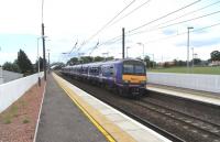 322 483 ready to leave Prestonpans with a North Berwick - Edinburgh service on 4 July 2009.<br><br>[David Panton 04/07/2009]