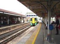 A Southern service, heading for Portsmouth and formed by EMU 377461, runs into the down island platform at Fratton. This will have travelled along the coast, probably from Brighton. Fratton EMU servicing depot is just off to the right of this platform. <br><br>[Mark Bartlett 18/06/2009]