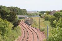 Looking east toward Bangour Jct from near Livingston North on 13 June 2009. Electrification masts march toward Bathgate.<br><br>[James Young 13/06/2009]