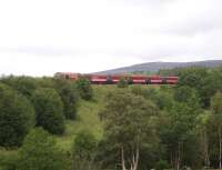 The <I>Marco Polo</I> special charter train approaching Carrbridge on 9 July taking passengers off the stricken cruise liner from Inverness to Kings Cross. [Bus links were organised from Invergordon Port to Inverness and from Kings Cross to Tilbury.] <br>
<br><br>[Gus Carnegie 09/07/2009]