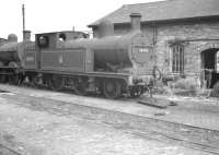 Aspinall ex-L&Y 2-4-2T no 50795 in sidings at Manningham shed, Bradford, probably in the late 1950s. The locomotive was officially withdrawn by BR in November 1959.<br><br>[K A Gray //]