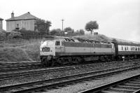 Two tone green Class 47 no 1779 passes Eastfield MPD with an Aberdeen - Queen Street service on the afternoon of 16 September 1972.<br><br>[John McIntyre 16/09/1972]