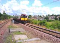 A Glasgow bound 314 211 approaching Croftfoot station on 15 July.<br>
<br><br>[John Steven 15/07/2009]
