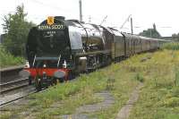 The <I>Cumbrian Mountain Express</I> railtour from Worcester to Carlisle runs through Leyland on the Down Fast line on 18 July 2009. LMS pacific no 6233 <I>Duchess of Sutherland</I> is in charge, having taken over the train at Crewe.<br><br>[John McIntyre 18/07/2009]