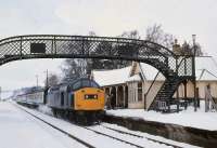 40065 calls at Carrbridge with a southbound train from Inverness on a snowy 22 March 1980.<br><br>[Peter Todd 22/03/1980]