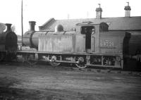 Reid N15 0-6-2T no 69221 stored out of use alongside Dunfermline shed in February 1959.<br><br>[Robin Barbour Collection (Courtesy Bruce McCartney) 11/02/1959]