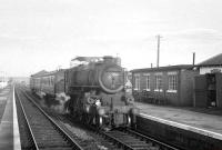 Ivatt class 4 2-6-0 no 43027 draws into Longtown with the Langholm - Carlisle branch train around 1962.<br><br>[K A Gray //1962]