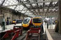 Variety at Glasgow Central, with NXEC in Platform 1, Virgin in Platform 2 and FTPE in Platform 3 at just after 1330 hrs on 27 July 2009.<br><br>[John McIntyre 27/07/2009]