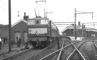E26053 <I>Perseus</I> with the RCTS <I>Great Central Railtour</I> at Penistone station on 13 August 1966. The train is preparing to leave for Sheffield Victoria following which the electric locomotive will hand over to steam haulage for the journey south to Marylebone via the GC London extension.<br>
<br><br>[K A Gray 13/08/1966]