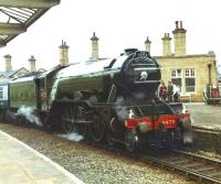 4472 <I>Flying Scotsman</I> struggles to round Shipley station west to south curve with the empty stock of <I>The North Yorkshireman</I> heading from Keighley to Bradford Forster Square in June 1981.<br><br>[David Pesterfield 30/06/1981]