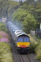 DRS 66419 with Inverness - Grangemouth Intermodal 4D47 leaves Blair Atholl having crossed the Tilt Viaduct on 31 July.<br>
<br><br>[Bill Roberton 31/07/2009]