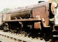 Bulleid <I>West Country</I> light Pacific no 34010 <I>Sidmouth</I> standing alongside Grosmont shed in 1984, some two years after recue from Woodham's scrapyard. The locomotive was later purchased by Southern Locomotives Ltd and moved to Sellindge in Kent in 1997, where it is awaiting restoration.<br>
<br><br>[David Pesterfield 21/08/1984]