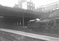 Gresley V1 2-6-2T no 67603 arriving at Glasgow Queen Street with empty stock in September 1962. Note the wire and pulley attachment on the side of the smokebox, used to release the slip-coupling after banking trains out of Queen Street up the 1 in 45 Cowlairs Incline. <br>
<br><br>[Ken Browne /09/1962]