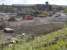 The once rail - connected former North British Steel Foundry site at Bathgate on 6 June 2009. The new railway to Airdrie will follow the boundary fence in the foreground (on the inside of the former alignment) in order to bypass retail developments in the old goods yard.<br><br>[Bill Roberton 06/06/2009]