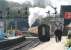 Having taken over from no 825, which brought in the train from Whitby, Standard class 4MT 2-6-0 no 76079 moves off towards Grosmont tunnel with the last service of the morning for Pickering on 24 April 2009. The original 1835 tunnel, now used as a pedestrian link between the station and shed, stands just off picture to the left.<br>
<br><br>[John Furnevel 24/04/2009]