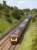 Diesel Hydraulic D1015 'Western Champion' coasts downhill from Lochmuir Summit towards Markinch with the <I>Western Chieftain</I> railtour heading back from Inverness to Bristol Temple Meads on 21 June.<br><br>[Bill Roberton 21/06/2009]